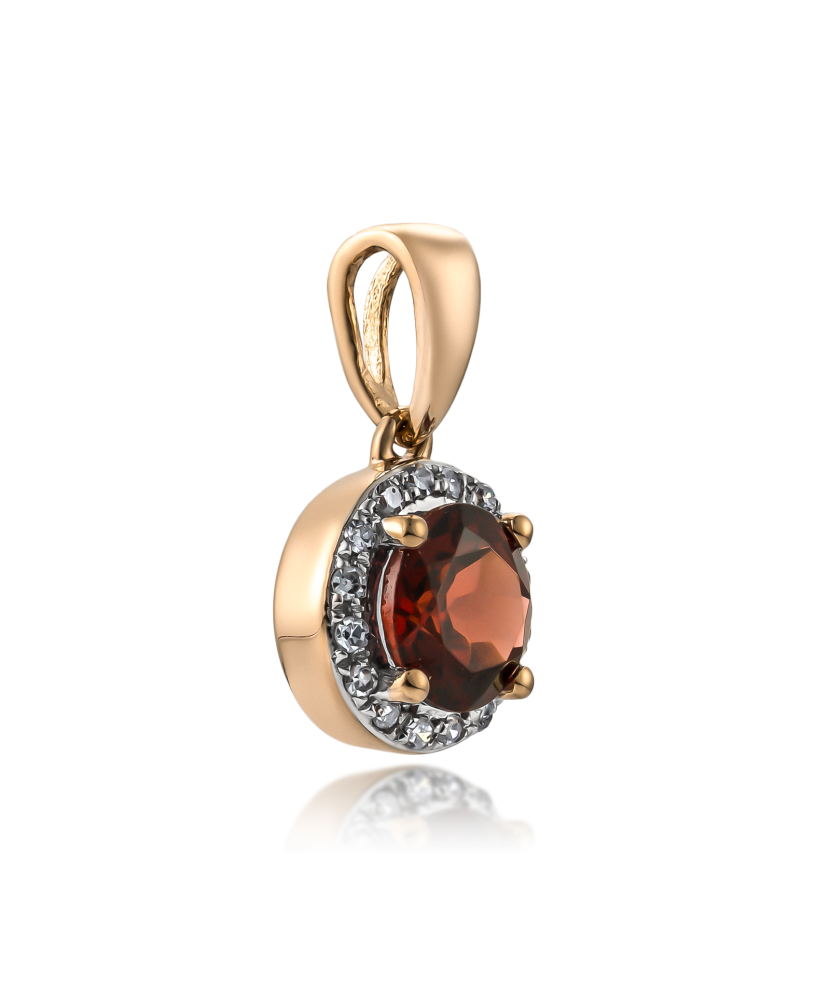 Gold pendant with garnet and diamonds "Heart"