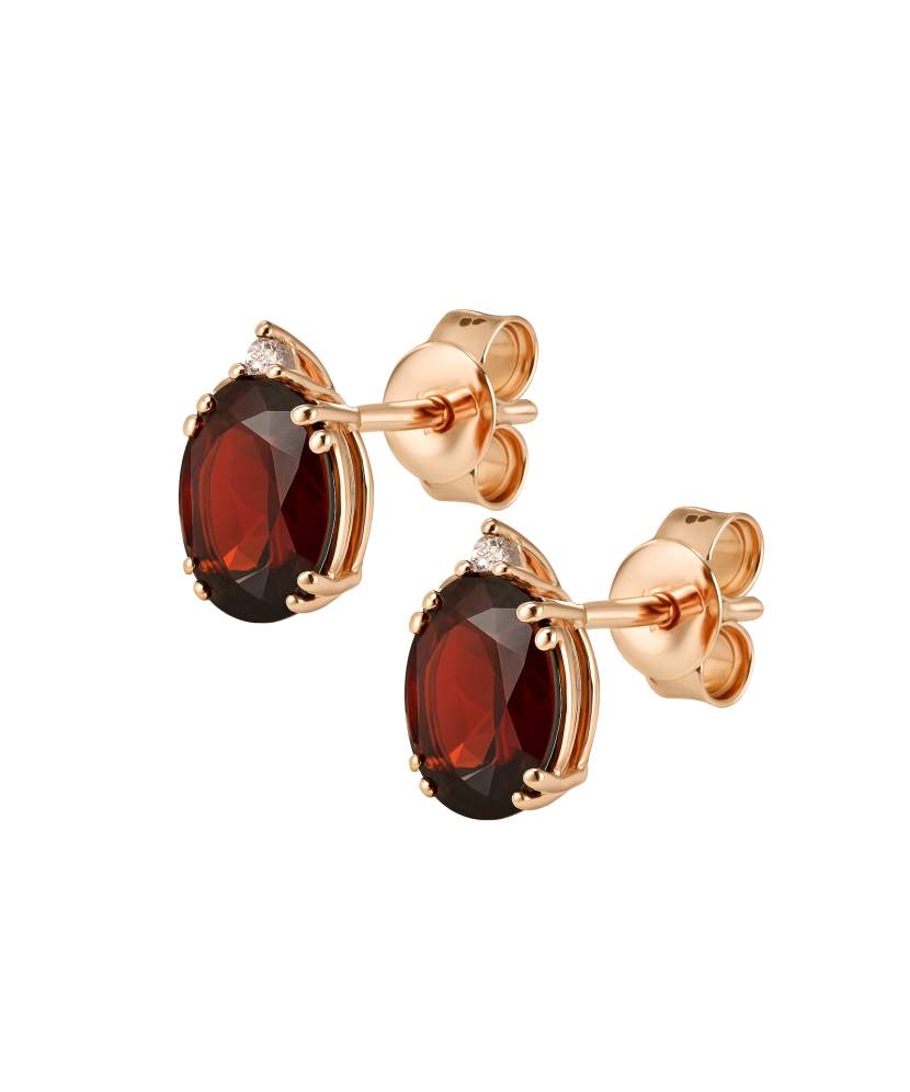 Gold earrings with garnet and zircons