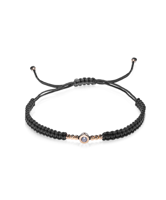 Black string bracelet with gold pendant