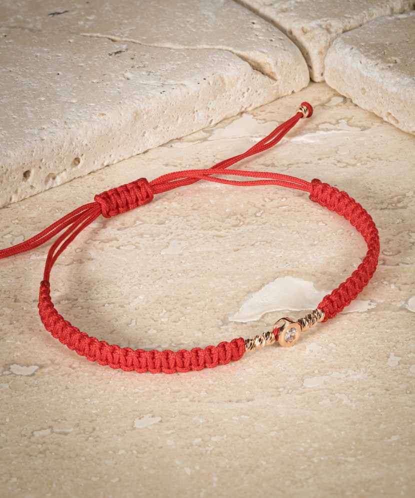 Red Thread Bracelet with a Golden Zirconia Pendant