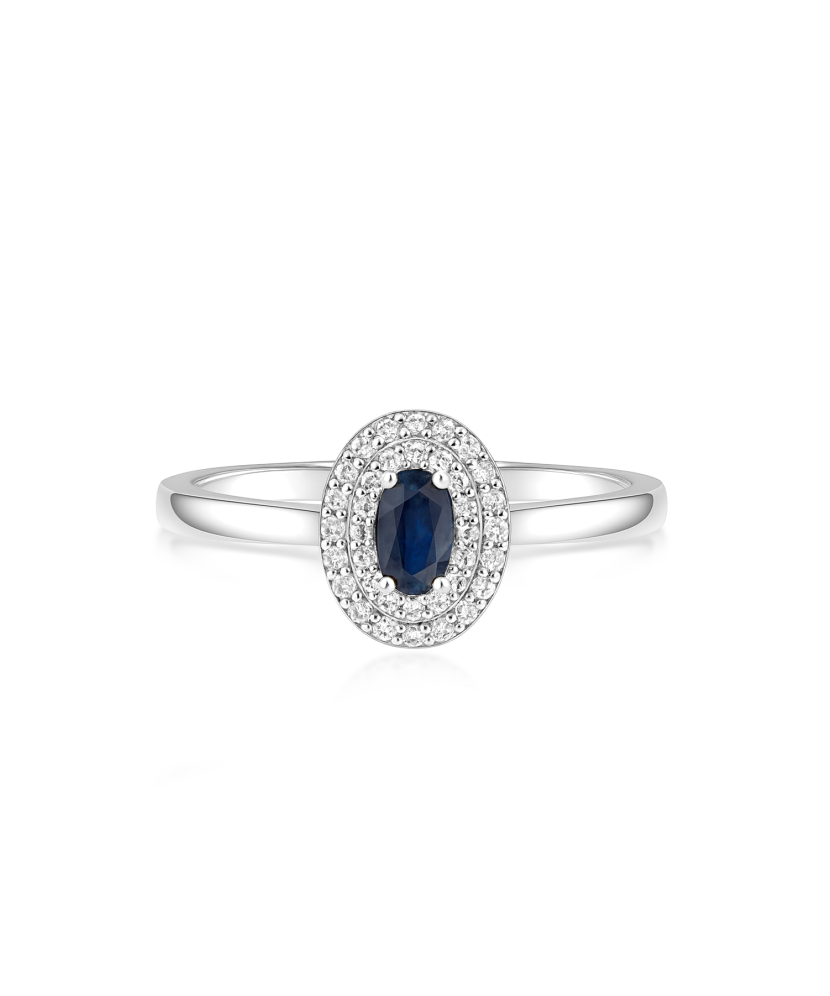 White gold ring with sapphire and diamonds