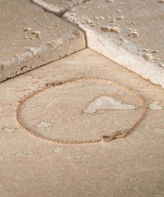 White gold bracelet with zircons "Infinity"