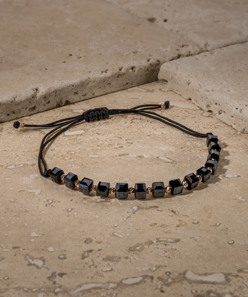 Black string bracelet with gold And Hematites Black string bracelet with gold And Hematites