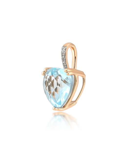 Gold pendant with topaz and zircons