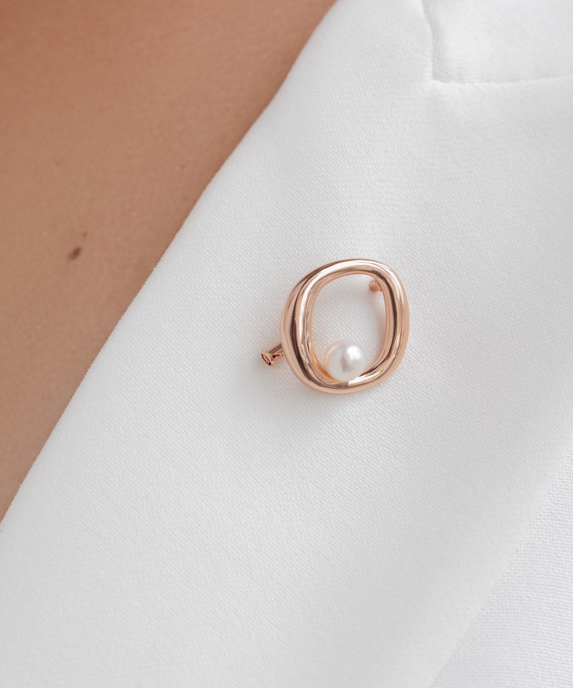 Gilded sterling silver brooch with pearl