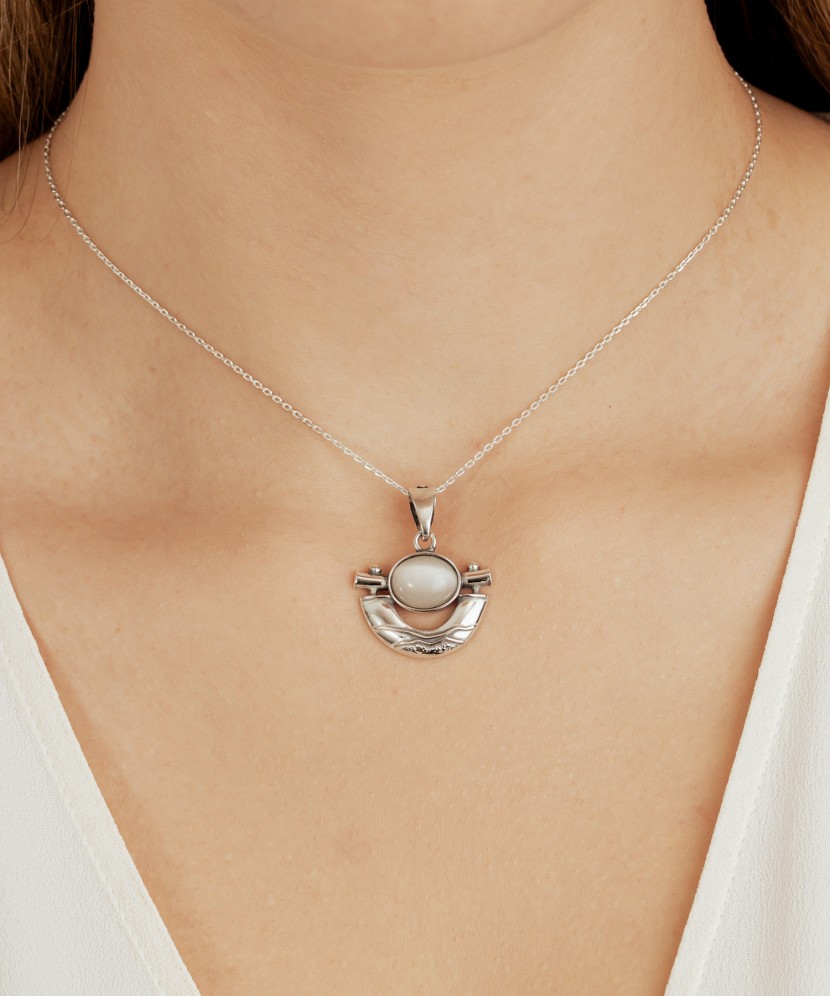 Sterling silver pendant with cats eye stone