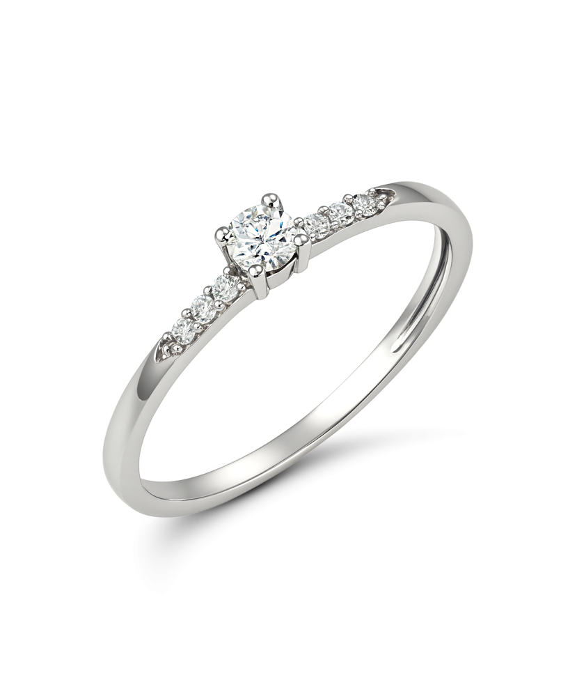 White gold ring with zircons