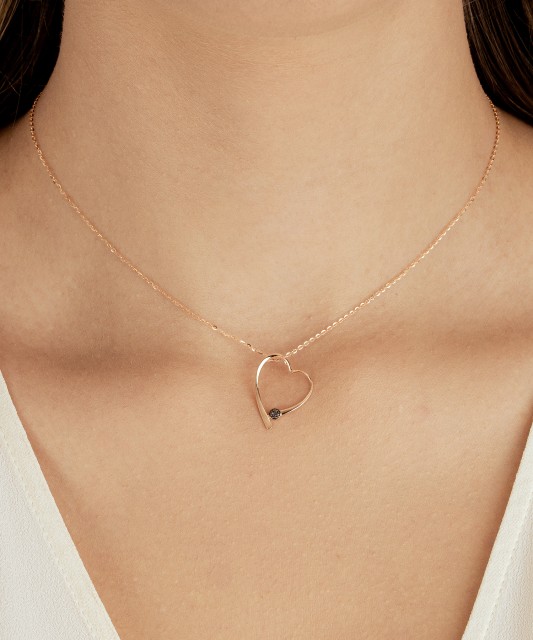 Gold pendant with black diamonds “Heart”