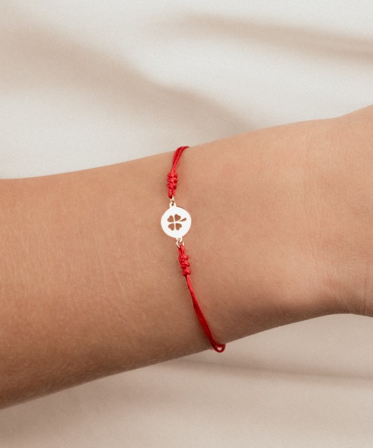 Red string bracelet with gold pendant "Clover"