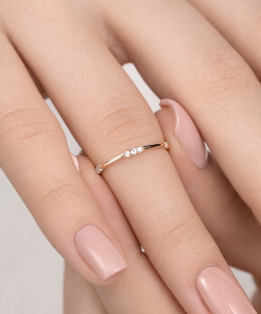 Gold ring with zircons