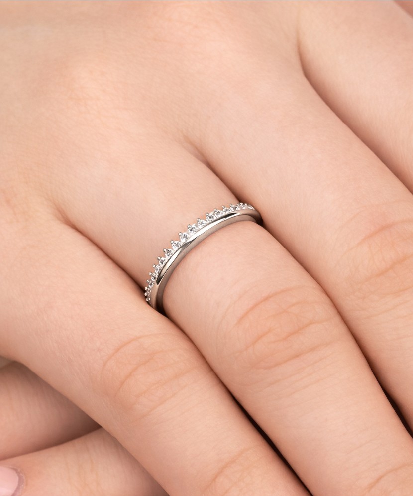 White gold ring with zircons