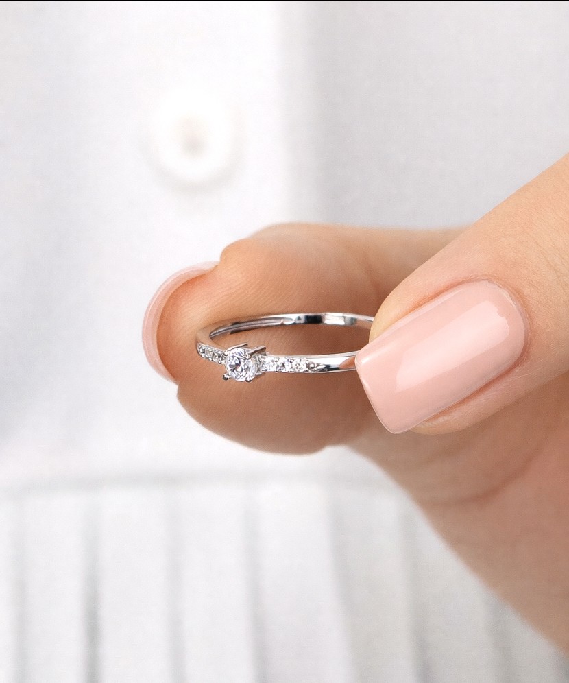 White gold ring with zircons