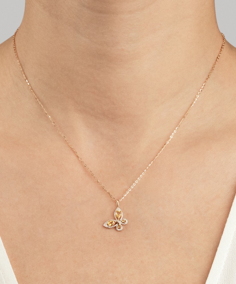 Gold pendant with citrines and diamonds