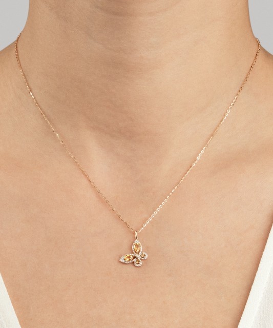 Gold pendant with citrines and diamonds