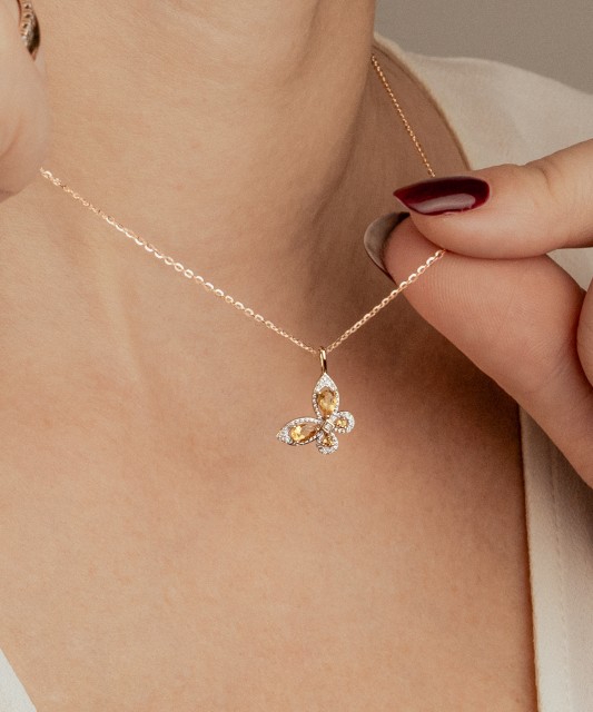 Gold pendant with citrines and diamonds