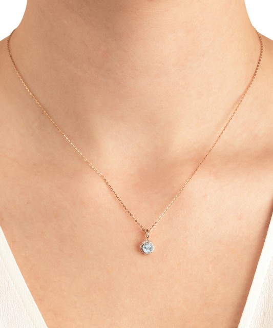 Gold pendant with topaz and diamonds