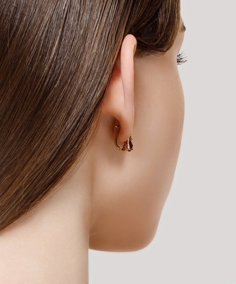 Gold earrings with sital and zircons