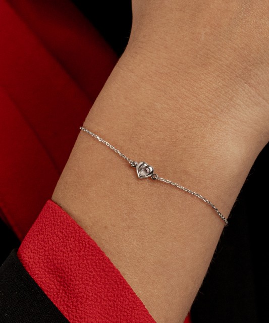 White gold bracelet with zircons "Heart"