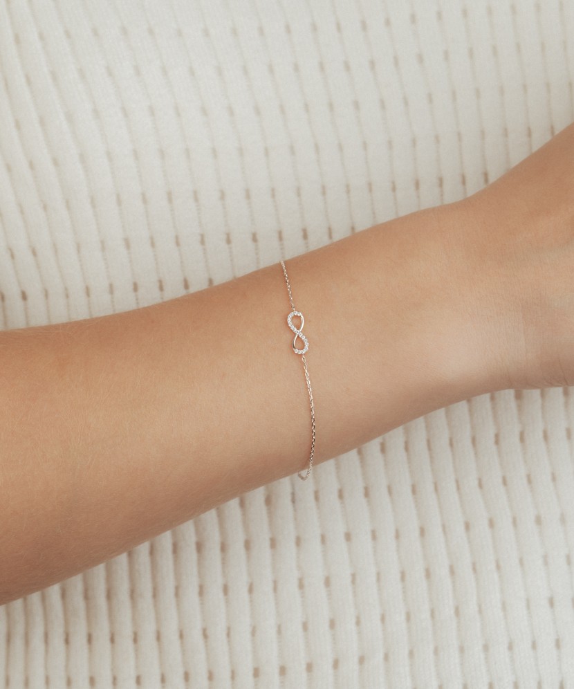 White gold bracelet with zircons "Infinity"