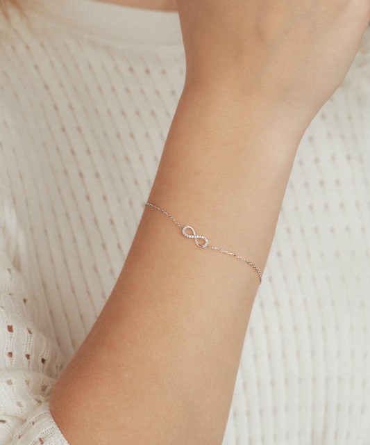 White gold bracelet with zircons "Infinity"