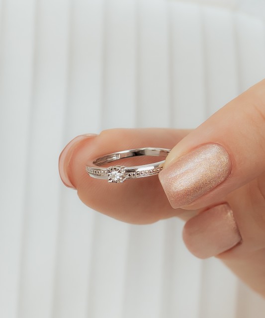 White gold ring with diamonds