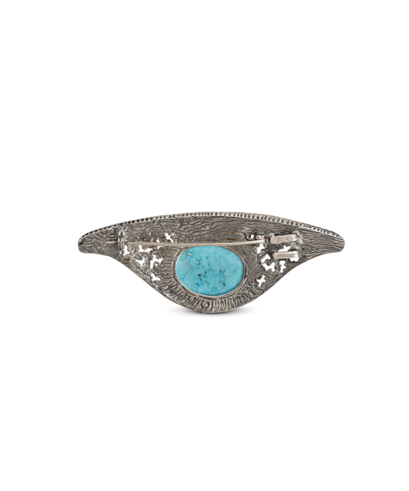 Silver brooch with turquoise