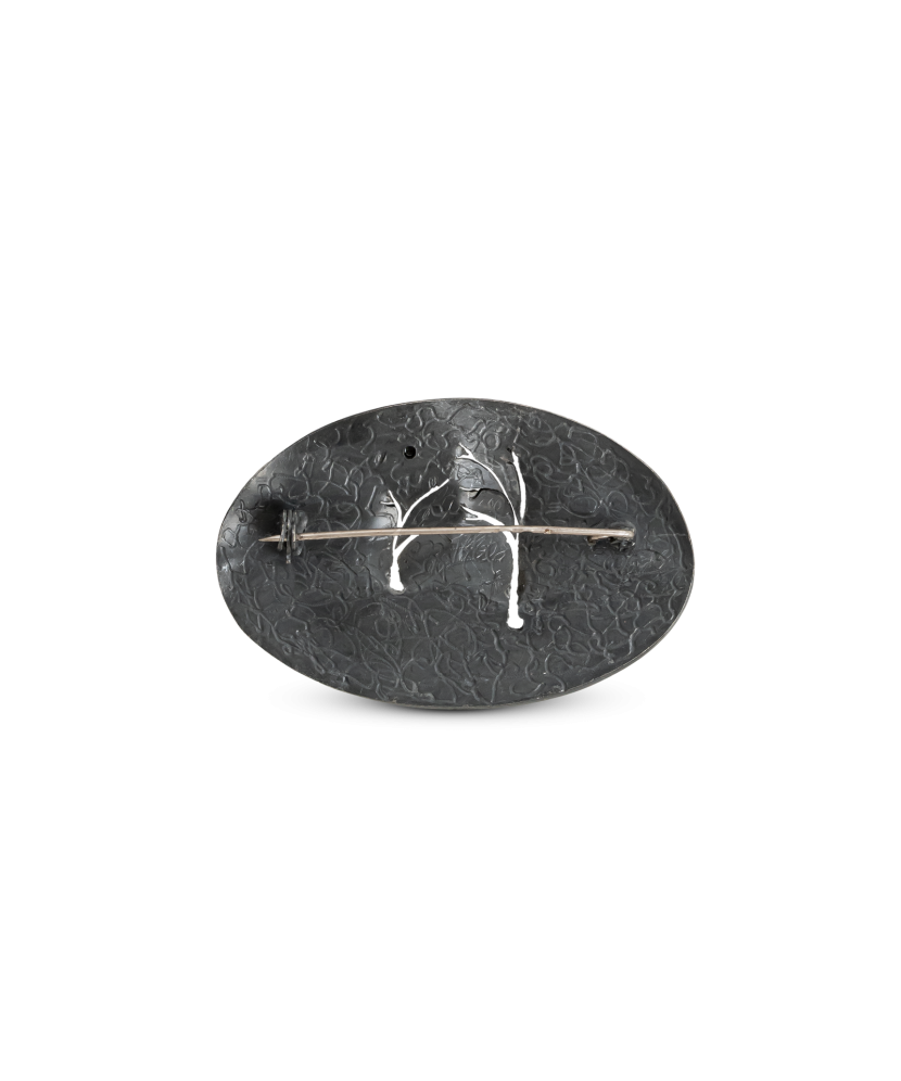 Silver brooch with mother-of-pearl