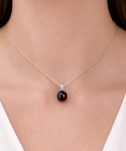 Sterling silver pendant with pearl and zircons