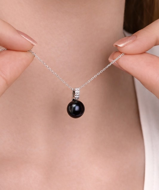 Sterling silver pendant with pearl and zircons