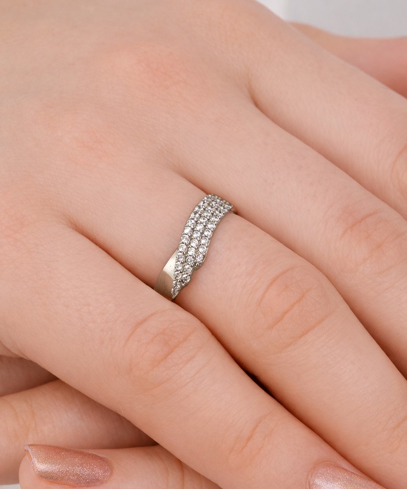 White gold ring with zircons