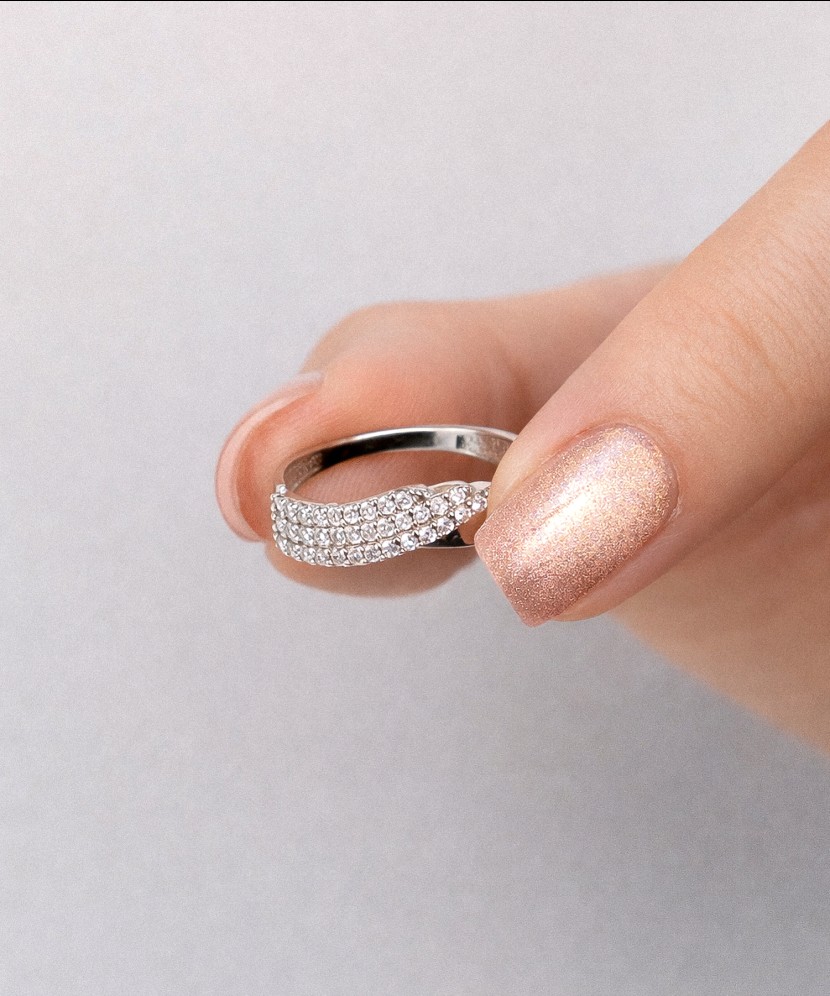 White gold ring with zircons