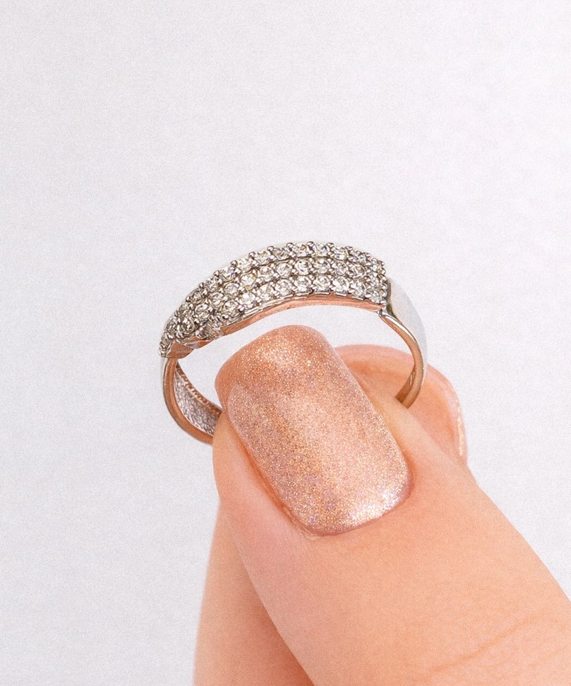 White gold ring with zircons