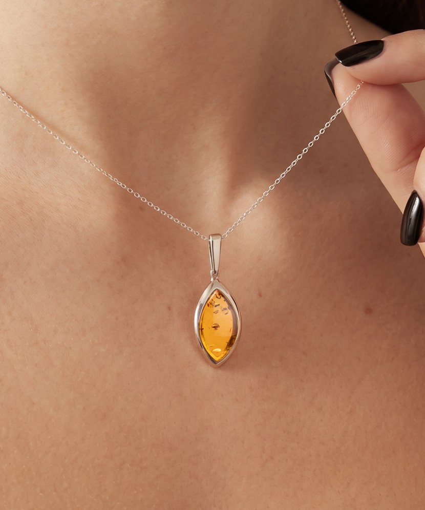 Sterling silver pendant with ambers