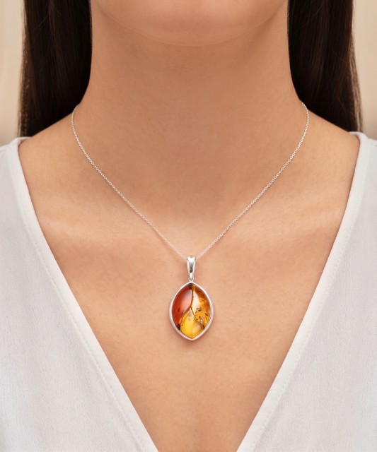 Sterling silver pendant with ambers