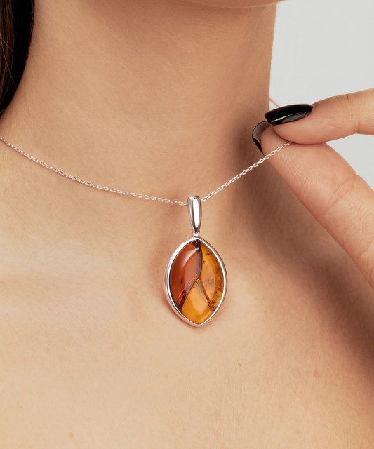 Sterling silver pendant with ambers