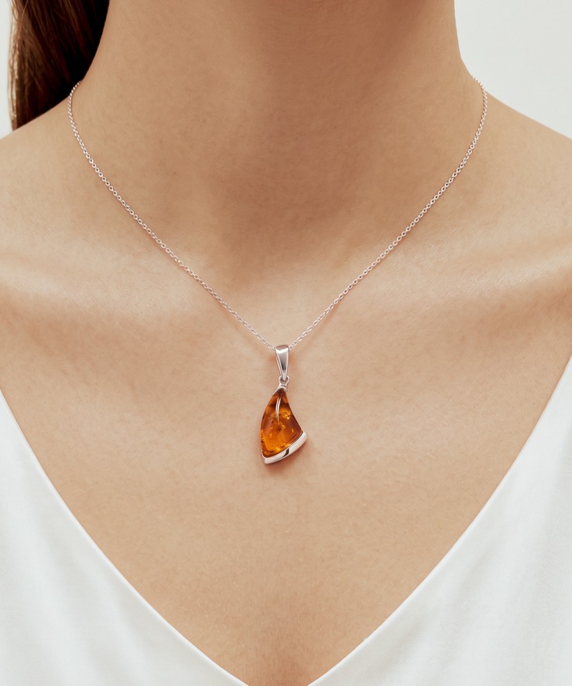 Sterling silver pendant with amber