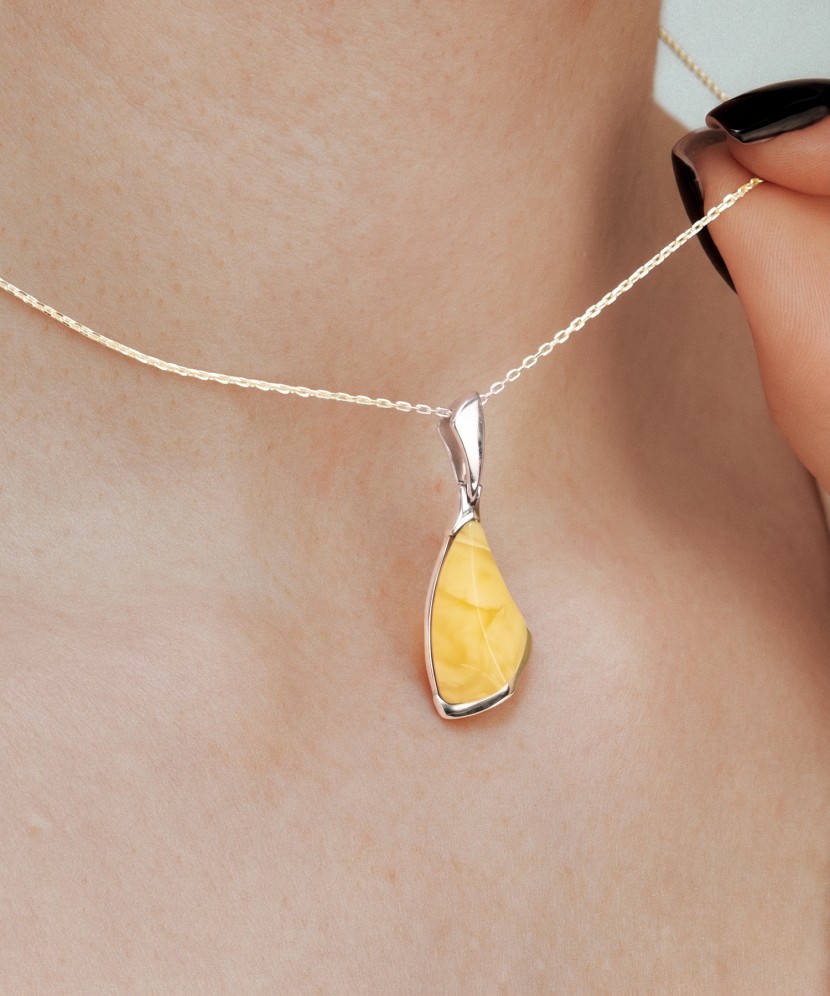 Sterling silver pendant with amber