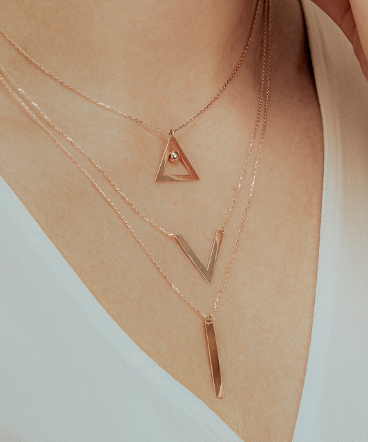 Triple gold chain with pendants
