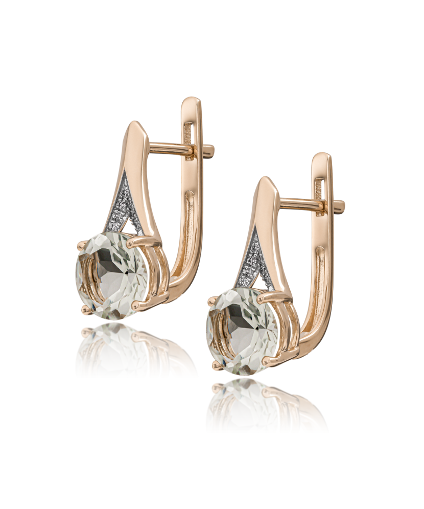 Gold earrings with diamonds and topazes