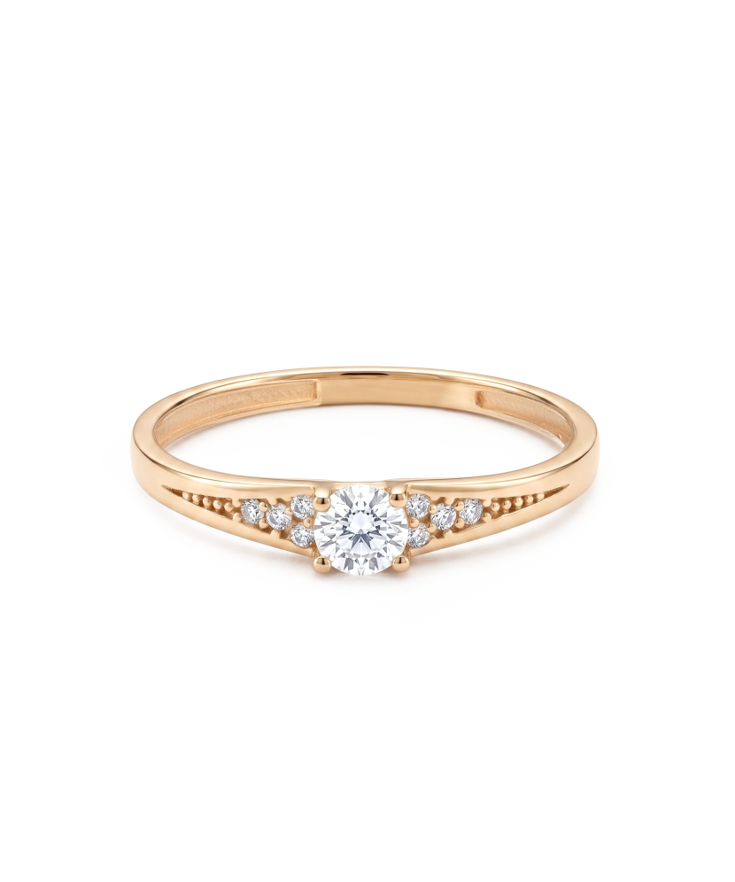 Gold ring with zircons