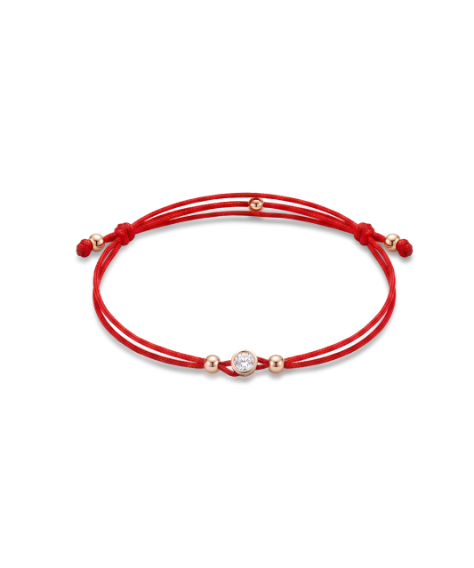 Red string bracelet with gold zirconia pendant