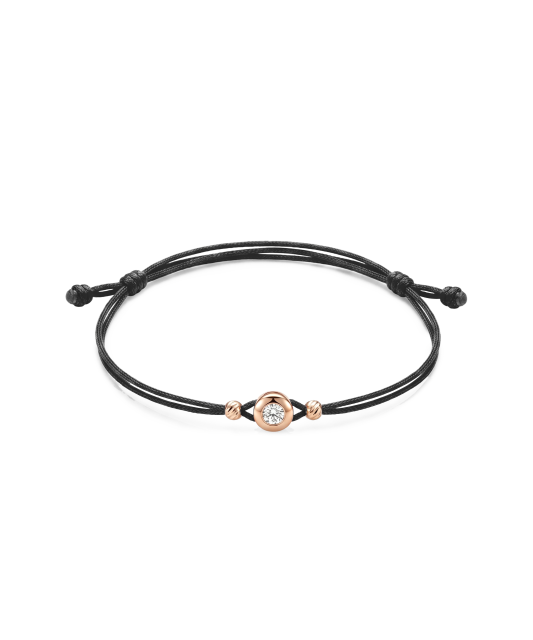 Black string bracelet with gold zirconia pendant