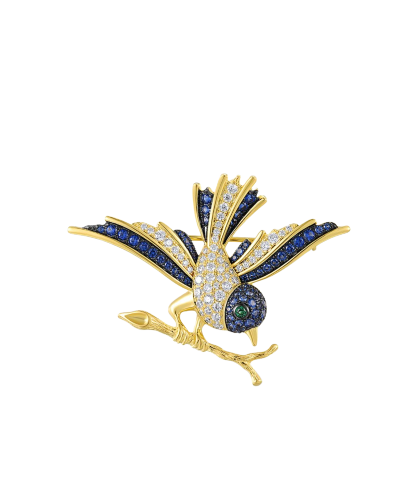 Gilded stetling silver brooch with spinels and zircons