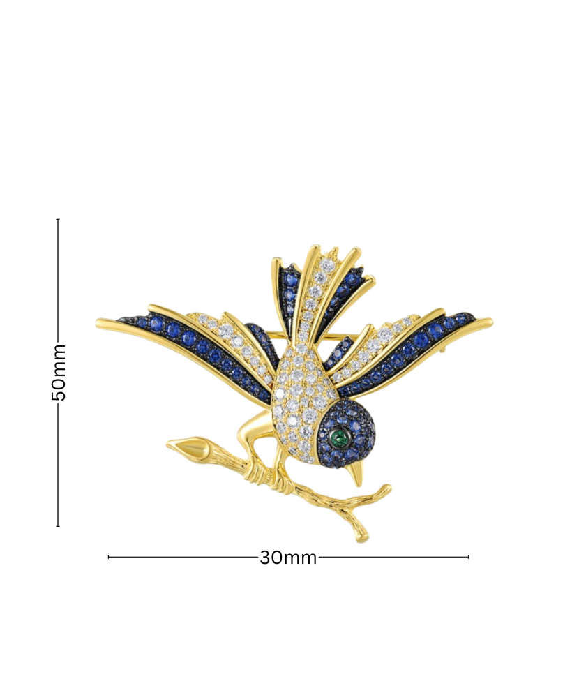 Gilded stetling silver brooch with spinels and zircons