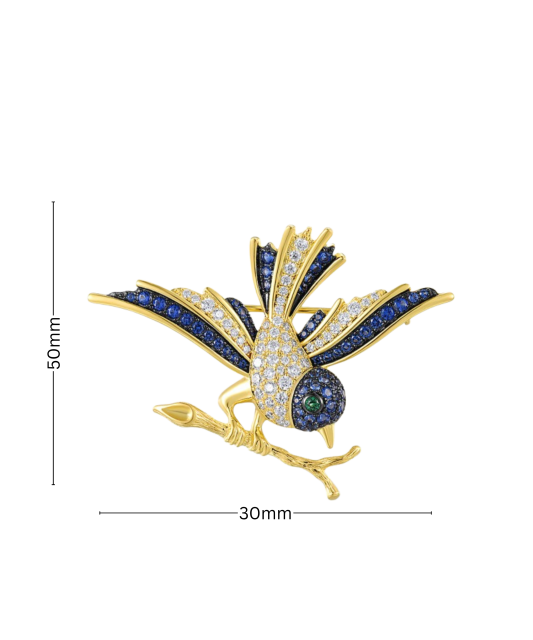 Gilded stetling silver brooch with spinels and zircons