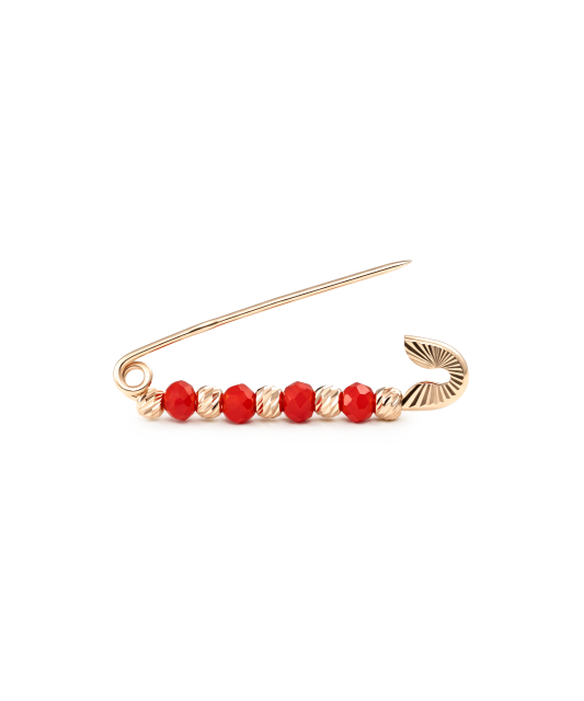 Gold brooch with onyx