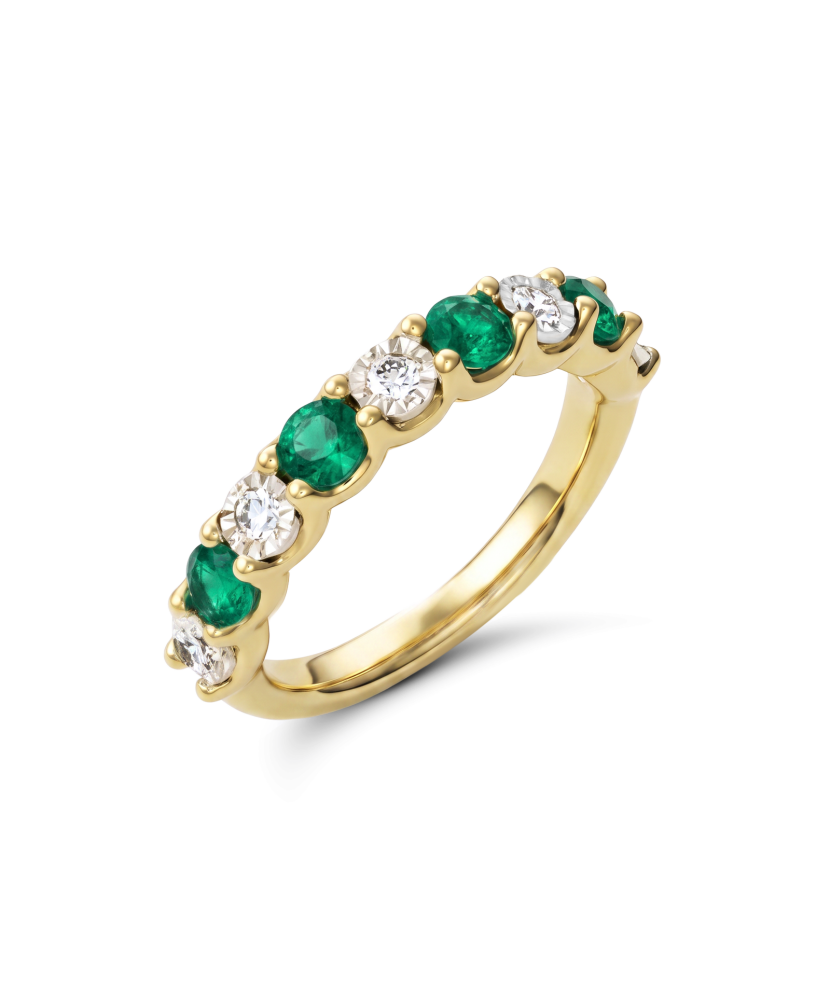 Yellow gold ring with diamonds and emeralds