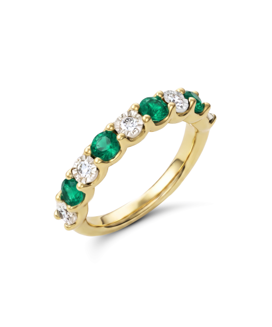 Yellow gold ring with diamonds and emeralds