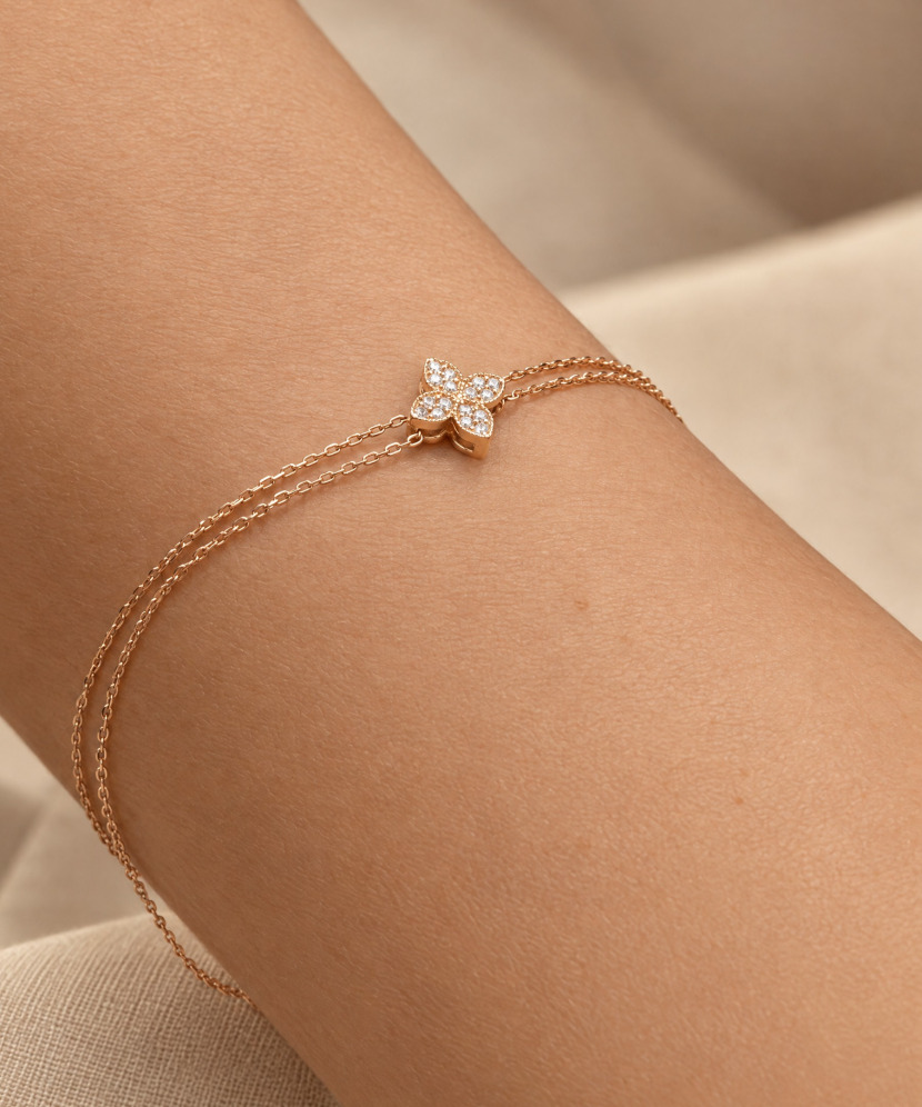 Gold bracelet with zircons