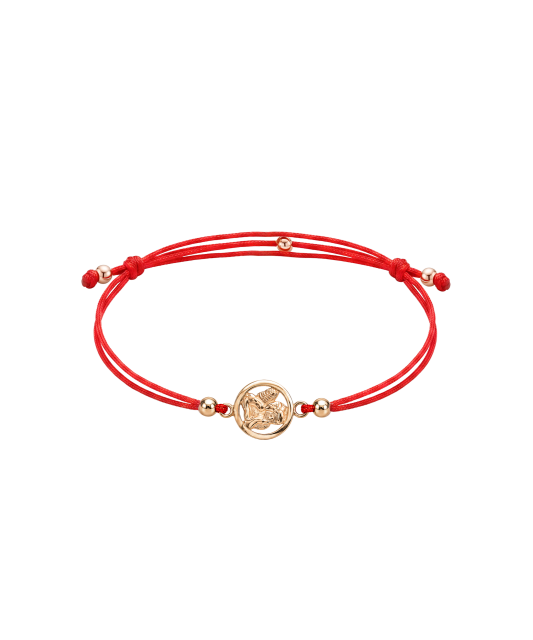 Red string bracelet with gold